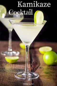 two martini glasses with limes in them on a wooden table next to the words kamikaze cocktail