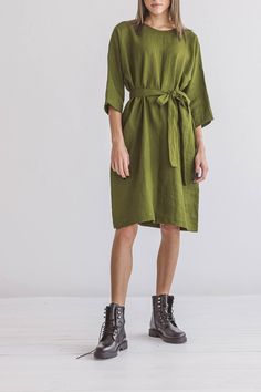 "DESCRIPTION: ♥ 100% natural European linen; ♥ safe Oeko-TEX® Standard 100 certified linen fabric ♥ softened midweight linen (185 g/m2) ♥ with 3/4 sleeves ♥ with pockets ♥ with belt ♥ oversize dress FIT ♥ length from the lower to the upper seam is about inches 39,4 / 100 cm ♥ measurements taken from a size S ♥ model is 173 cm and wearing a size S SIZE CHART: XS: Bust 30.7\"- 32.7\" (78-83 cm) , Waist 23.6\"- 25.6\" (60-65 cm), Hips 33.5\"- 35\" (85-89 cm) S: Bust 33\"- 35\" (84-89 cm) , Waist 26 Spring Linen Dresses With Rolled Sleeves, Summer Linen Dress With Half Sleeves, Green Linen Summer Dress For Work, Spring Linen Dress With Half Sleeves, Daywear Linen Dress With 3/4 Sleeves, Summer Linen Dress With 3/4 Sleeves, Half Sleeve Linen Dress For Summer, Linen Dress With 3/4 Sleeves For Daywear, Green Linen Dress With Pockets For Spring