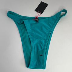 New South Beach Turquoise Crop Scoop Bikini High Leg Bottom Size 8 Some Measurements In Images 82% Polymide 18% Elastane Green T-back Swimwear For Beach, Blue T-back Summer Swimwear, Blue T-back Tankini For Sunbathing, Blue T-back Tankini For Beachwear, Turquoise Stretch Tankini For Vacation, Blue T-back Tankini Beachwear, Turquoise Bottoms For Summer Beach Party, Stretch Turquoise Swimwear For Pool, Summer T-back Bottoms For Sunbathing