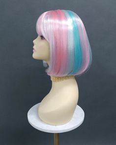 "Simple short straight bob wig with bangs. Lightweight and easy to wear. Inside cap has adjustable elastic straps, no combs or clips. Color: Pink, White, Blue Style: 9 inches, Short, straight Circumference: Default at 21\" with adjustable cap (max 22\"). Materials: Synthetic Wig Fiber All sales are final. Please read all store policies before purchasing." Boy Wig, Short Straight Bob, Bleu Pastel, Straight Bob, Blue Pastel, Bob Wig, Costume Wigs, Short Wigs, Blue Style