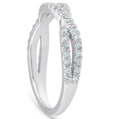 a white gold ring with diamonds on it