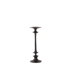 a tall black candle holder on a white background with no one in it's place