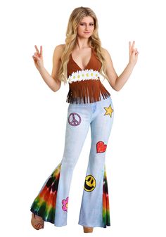 a woman in a hippie outfit with peace signs on her chest and hands up