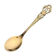 a golden spoon with an ornate design on it