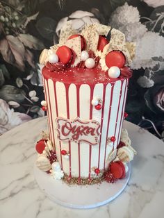 a decorated cake sitting on top of a table