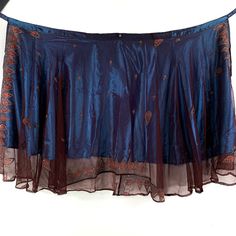 Our double layer Long Lotus Flower Aari Skirt is a stunning decorative wrap around skirt that hugs your waist & hips, letting the elegant embroidered cloth do the rest!   The vintage sheer outer material is elaborately decorated & finished in traditional Aari style.  Handmade from fine quality vintage Silk saris ensuring every dress is unique just like you!  In India, these sari are very popular wear at weddings and parties.  The under-layer is a vibrant satin material that shimmers as you move. Boho Wrap Skirt, Satin Wrap Skirt, Hippie Rock, Maxi Wrap Skirt, Hippie Skirt, Color Personality, Boho Skirt, Wrap Maxi Skirt, Wrap Around Skirt