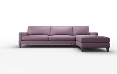 a purple couch sitting on top of a white floor