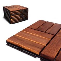 several pieces of wood sitting on top of each other in front of a white background