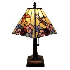 a table lamp with a dragon on it