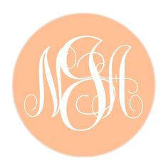 a round monogrammed sticker with the letter m in white on an orange background