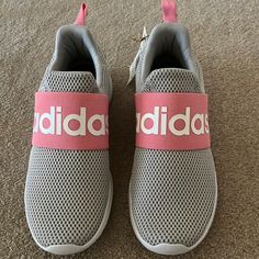 Adorable New Gray Adidas Lite Racer Adapt 4 Slip On Sneakers With A Cotton Candy Pink Band Across The Front With White Print. Will Also Fit A Women’s Size 7 1/2 Foot. Padded Ankles, These Are Very Lightweight And Comfortable. Sporty Pink Slip-on Sneakers For Spring, Pink Slip-on Sneakers For Sports With Round Toe, Pink Non-slip Low-top Slip-on Sneakers, Pink Breathable Slip-on Sneakers, Pink Slip-on Sneakers For Light Sports, Pink Casual Slip-on Sneakers For Sports, Casual Pink Slip-on Sneakers With Branded Insole, Casual Pink Slip-on Sneakers For Sports, Pink Non-slip Sporty Slip-on Sneakers