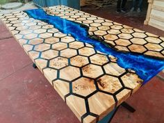 a table that has been made to look like a river running through the center of it