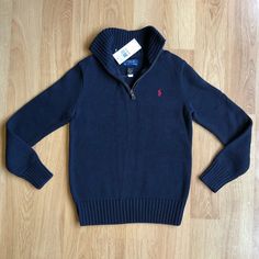 New With Tags Ralph Lauren Boy 1/4 Zip Knit Sweater Navy With Red Rl Logo Embroidered On Left Chest “Polo” On Working Zipper Rib-Knit Mockneck Quarter-Zip Placket Long Sleeves With Rib-Knit Cuffs Rib-Knit Hem Perfect Condition - No Rips Or Stains. Never Even Tried On. Absolutely Beautiful, Softjust So Preppy And Handsome. Size: M (10-12) 100% Cotton Please Feel Free To Send An Offer Smoke Free Home. Navy Polo Sweater With Ribbed Collar For Winter, Navy Long Sleeve Polo Sweater, Navy Long Sleeve Polo Sweater For Winter, Navy Cotton Polo Sweater For Winter, Navy Winter Top With Ribbed Collar, Navy Sweater With Ribbed Collar For Fall, Navy Fitted Knitted Sweater, Casual Navy Knit Polo Sweater, Navy Ribbed Collar Sweater For Fall