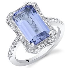 A multidimensional experience Add a sedated elegance to any ensemble with this unrestrained Tanzanite beauty. This classic ring features a rectangular shape Peora simulated Tanzanite gemstone in .925 sterling silver. Technically crafted and cut for optimum brilliance, our simulated Tanzanite gemstones are optically identical to their mined counterparts, but they are made using alternative materials. We're big fans of eco-luxury. Handcrafted in pure .925 sterling silver goodness, this ring has been carefully coated in an elegant rhodium finish. Our artisans are expertly trained in this process which fortifies the ring's strength, shine and brilliance. Too many pieces on your wishlist and can't decide? Good problems to have! Our concierge stylists are here to help with all of your jewelry qu Octagon Ring, Jewelry Questions, Octagon Shape, Paraiba Tourmaline, Tanzanite Ring, Tanzanite Gemstone, Tourmaline Gemstone, Classic Ring, Rings For Her