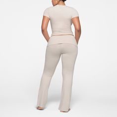 Find SKIMS Cotton Jersey Foldover Pant on Editorialist. Your go-to pant for looking cute and feeling comfy. Our beloved lounge style features a comfortable folded waist that adds a feminine touch to your looks at home and on the go. Made with our signature soft, breathable jersey fabric that enhances your curves and comfort. Pair with a SKIMS Cotton Jersey tee or tank for a selfie-worthy set. Fits true to size. Red Sweatpants, Personal Things, Lounge Style, Jersey Pants, Jersey Tee, Lounge Pants, Pistachio, Jersey Fabric, Stretch Cotton