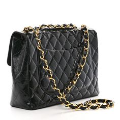 This is an authentic CHANEL Patent Quilted XL Jumbo Single Flap in Black. This chic classic flap shoulder bag is crafted of luxurious diamond quilted glossy patent leather in black. The bag features a polished gold chain link leather threaded shoulder strap and a facing polished gold plated Chanel CC turn lock. This opens the facing flap to a black leather interior with zipper and patch pockets. Flap Shoulder Bag, Leather Thread, Diamond Quilt, Classic Flap, Leather Interior, Chain Link, Gold Chain, Patch Pocket, Gold Chains