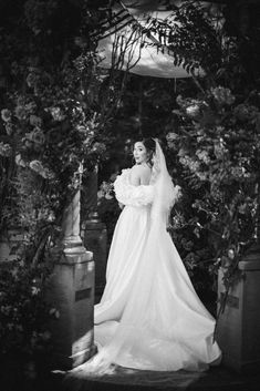 black and white photograph of a woman in a wedding dress