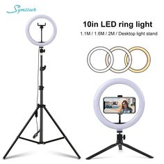 an image of a ring light on a tripod with the phone and camera attached to it