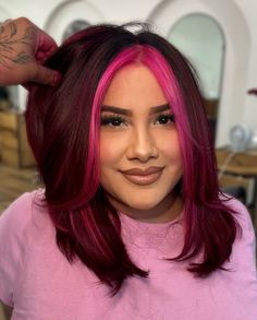 #pinkhair #pravana #iehairstylist #murrietahairstylist #solasalon #layers #Honglayers #curtainbangs #mecore #explore #explorepage #fyp #pink #girlyaesthetic Magenta Hair On Black Women, Fuschia Pink Hair, Red Hair With Pink Bangs, Magenta Money Piece Hair, Pink And Red Hair Dye, Red Hair Pink Outfit, Burgundy Pink Hair, Maroon And Pink Hair, Hot Pink Peekaboo Hair