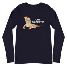 Fans of Bearded Dragons will love this cute, funny drawing of a Beardie asking for his favorite snack, crickets! Unisex sizing for both men and women. Versatile and comfortable, this Bella + Canvas long sleeve tee is the perfect addition to anyone's wardrobe. * 100% combed and ring-spun cotton * Heather colors are 52% combed and ring-spun cotton, 48% polyester * Athletic Heather is 90% combed and ring-spun cotton, 10% polyester * 32 singles * Retail fit * Crew neck * Cover-stitched collar * 2'' Novelty Long Sleeve T-shirt With Graphic Print, Funny Long Sleeve T-shirt With Text, Dragon Gifts, Beard Humor, Dragon Shirt, Neck Cover, Funny Drawings, Bearded Dragon, Favorite Snack