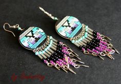 Beautiful ethnic earrings made from wood and hand painted. Decorated with beaded fringes. Dimensions: width 2.5 cm length with hooks: 8.5 cm Bohemian Turquoise Jewelry With Artistic Design, Bohemian Hand Painted Earrings For Festivals, Bohemian Hand Painted Earrings For Crafting, Bohemian Hand Painted Purple Earrings, Bohemian Turquoise Hand Painted Jewelry, Turquoise Bohemian Hand Painted Jewelry, Purple Hand Painted Bohemian Earrings, Hand Painted Turquoise Bohemian Earrings, Coconut Earrings