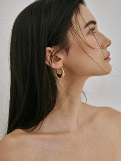 Add a touch of luxury with our Chunky Medium Hoop Earrings. Crafted with 18k gold vermeil, these earrings offer a bold yet elegant look. Elevate any outfit with these sophisticated hoops that are perfect for both day and night. Medium Hoop Earrings, Jewelry Lookbook, Mens Beaded Bracelets, Bead Charm Bracelet, Men Earrings, Pearl Gemstone, Elevate Your Look, Men's Rings, Cuff Bangles