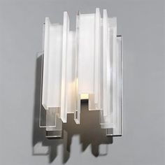 a wall mounted light that is on the side of a wall