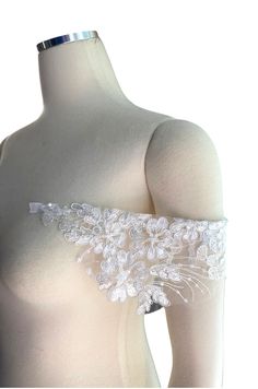 "READ BEFORE PLACING YOUR ORDER: -Message me with pictures of your dress so I can match it with the closest lace I have.  - Buy samples of similar lace here: https://www.etsy.com/listing/190961642/sampleswatch-lace-chiffon-ribbon-or?ga_search_query=sample&ref=shop_items_search_1 - My stock is very limited and the order are made after they are placed. - This is a custom order. I don't accept returns. - Read the reviews. You bought your dream dress but it doesn't have straps! No problem. I can made them for you. I'll try my best to match it as much as possible to your dress so they will look like part of the original design and you will feel happier with the result! Beautiful lace strap in off white color. It has tiny clear sequins. 16 inches length and 4\" widest part. It will have one side Fitted White Lace For Mother Of The Bride, Fitted White Bridal Accessories For Bridesmaids, Fitted Lace Bridal Accessories For Bride, Fitted Lace Bridal Accessories For Mother Of The Bride, Fitted Tulle Wedding Dress For Mother Of The Bride, White Fitted Lace For Bride, Lace Bridal Accessories Fitted For Mother Of The Bride, Fitted White Lace For Bride, Fitted White Lace For Wedding Night