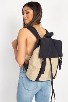 Our hemp backpack is a versatile accessory. Large enough for textbooks or a weekend getaway, it's also light enough for a trip to the beach or a festival pack. The functional buckles and straps on the front add a nostalgic look. The hemp is a rustic handwoven fabric that is lined with a sturdy canvas. The inside top has a drawstring to secure your items and an inside pocket keeps your small items handy. The canvas shoulder straps are lightly padded for all day comfort. Details:     Construction: 70%Cotton 30%Hemp     Dimension: 14 high X 12 wide X 4.5 deep     Belt length- 22 - 37 Inches     Made in Nepal Adjustable Backpack For Everyday Summer Use, Casual Natural Color Backpack For Travel, Casual Rectangular Backpack With Adjustable Straps, Summer Adjustable Backpack, Casual Natural Color Standard Backpack, Casual Adjustable Backpack For Back To School, Natural Backpack With Adjustable Strap, Natural Color Backpack With Adjustable Strap, Eco-friendly School Backpack With Adjustable Strap