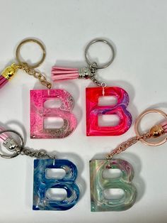 Letter B resin keychain made with alcohol ink. keychain is approximately 1 1/2 by 1 1/2 inches. Personalized Letters, Letter B, Alcohol Ink, Resin Art, Blue And Purple, Etsy Gifts, Alphabet, Initials, Purple