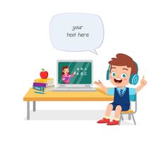 a boy sitting at a desk with a laptop and headphones