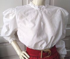 80s eyelet lace blouse, austrian ivory - white top, victorian edwardian style, cropped blouse, large puffy sleeve, big sleeve r, uffled collar and sleeve. vintage items always show signs of being worn please check the measurements before ordering Measurements laying flat : shoulders :40 cm (15,5 inches) armpit to armpit :52 cm (20,5 inches) total lenght :35 cm (14 inches) sleeve lenght :60 cm (23,5 inches) Fitted Peasant Blouse With Lantern Sleeves, Fitted Blouse With Broderie Anglaise And Ruffled Collar, Vintage Tops With Blouson Puff Sleeves, Fitted Collar Top With Broderie Anglaise, Fitted Swiss Dot Top With Puff Sleeves, Vintage Fitted Blouse With Gathered Sleeves, Vintage Fitted Tops With Gathered Sleeves, Vintage Lantern Sleeve Tops For Daywear, Fitted Tops With Gathered Sleeves And Ruffled Collar