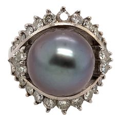 This is part of Chairish’s Fine Jewelry assortment.  Lovely Tahitian Pearl Ring set in 14k white gold with a diamond surround. Made in Japan, this ring features 32 diamonds measuring between 1.96mm to 2.72mm. The pearl measures 13.15mm.   The ring is in very good original condition with minor imperfections.  Dimensions. 1” width, .88” depth, .63” height Ring size: 6 Tahitian Pearl Ring, 2024 Moodboard, Diamond Cocktail Rings, Tahitian Pearls, Cocktail Ring, Pearl Ring, Cocktail Rings, Ring Set, Ring Sets