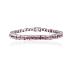 This is part of Chairish’s Fine Jewelry assortment.  This Art Deco Style Ruby and Diamond Wedding Tennis Bracelet in 18K gold showcases 6.41 carats endlessly sparkling natural ruby and diamonds. It measures 7 inches long in length.  Ruby improves mental strength.  Designed with perfect square cut ruby set in center with diamonds set on top and bottom of the ruby to make you stand out on any occasion or event. The elegant style complements the attire beautifully and is a perfect Engagement Gift, Luxury Ruby Diamond Bracelet, Luxury Red Diamond Bracelet For Formal Occasions, Red Luxury Tennis Bracelet For Formal Occasions, Luxury Ruby Diamond Bracelet For Formal Occasions, Luxury Red Diamond Bracelet For Anniversary, Luxury Red Diamond Tennis Bracelet, Formal Pink Ruby Bracelets, Formal Red Diamond Bracelet, Formal Pink Ruby Bracelet