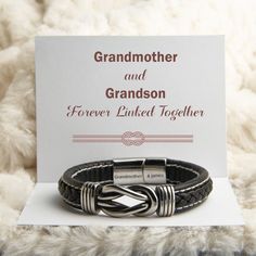 PROMOTION FOR ALL ITEMS 10% off on two or more items purchased Free shipping over $50 Design Interpretation With a beautiful design and gift card message, this bracelet is a perfect gift for your grandson. Gift your grandson this bracelet and remind him that although you are apart, you will always connect. Let him know 1st Grandson Gifts, Grandmother And Grandson, To My Grandson, Love For Him, Grandson Gift, Bouquet Gift, Gift Bouquet, My Grandson, Braided Leather Bracelet