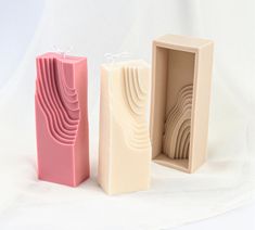 three different shaped soaps sitting next to each other