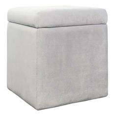 an ottoman with a white cover on it