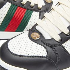 Find GUCCI Screener Sneakers on Editorialist. Gucci has long been synonymous with classic jewellery and Italian craftsmanship, however it is now redefining luxury for the 21st century through contemporary design and approach to fashion. The screener trainers are influenced by classic 70s sneakers, named after an offensive move by a player in basketball; these screeners feature the house’s monogram and the iconic green and red stripes. Leather Uppers, Mesh Underlays, Textile Lining, Perforated Si Gucci Screener Sneakers, 70s Sneakers, Gucci Screener, Classic Jewellery, Gucci Jewelry, Prada Eyewear, Italian Craftsmanship, S Monogram, Buy Gucci