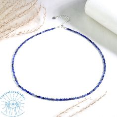 Kyanite Minimalist Choker 2mm Tiny Blue Gemstone Beaded Dainty Necklace Adjustable Yoga Crystal 925 Silver Chain Necklace Gift for Sister Wife Mom Her️🌟❤️🌈🌿 🌟Material : Kyanite, Kyanite Stone, 925 Silver Chain, Natural Stones, Natural Crystal, Rough Gemstones, Raw Stone 🌟Quality: AAA+ 🌟Length: 15"+2" silver clasp 🌟Beads size: 2 mm 🌟Size: Adjustable 🌻+ Free gift pouch🌈🌿 😊🌻Certainly! If you need any customization, feel free to reach out. I'm here to assist you. 🌻😊 🔮From the choice Blue Sterling Silver Necklaces With Tiny Beads, Sterling Silver Blue Jewelry With Tiny Beads, Blue Sterling Silver Jewelry With Tiny Beads, Sister Wife, Gift For Sister, Gift Pouch, Rough Gemstone, Blue Gemstones, Raw Stone