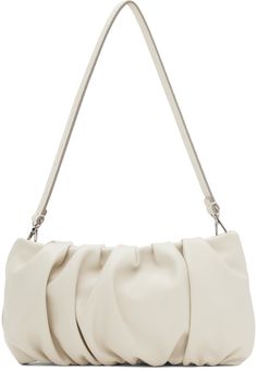 Grained leather shoulder bag in off-white. · Gathering throughout · Detachable shoulder strap · Zip closure · Patch pocket at interior · Suede lining · H4.5 x W9 x D1 Supplier color: Cream Staud Formal Bag With Removable Pouch, Formal Staud Bag With Removable Pouch, Elegant Staud Shoulder Bag, Staud Rectangular Shoulder Bag With Detachable Strap, Elegant Staud Shoulder Bag With Removable Pouch, Elegant Staud Shoulder Bag For Daily Use, Chic Staud Shoulder Bag, Chic Staud Shoulder Bag With Double Handle, Chic Staud Bag With Detachable Strap