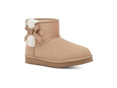 PRICES MAY VARY. Suede upper Fashionable bows Poly-wool blend sockliner EVA outsole Faux fur lining Ribbon Uggs, Uggs Mini, Uggs With Bows, Bow Boots, Koolaburra By Ugg, Mini Bows, Womens Uggs, Mini Fashion, Ankle Booties