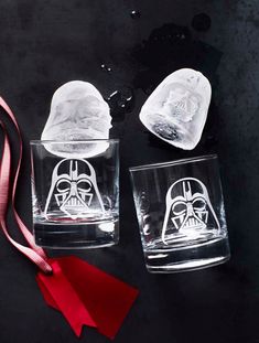 two star wars glasses with the faces of darth vader on them