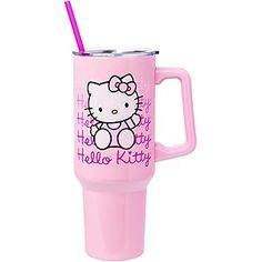 a pink hello kitty cup with a straw in it