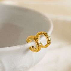 Boost your accessory game with our exquisite 18k gold plated huggie hoop earrings, meticulously designed for style and comfort. Crafted to perfection, these hoops boast water and tarnish resistance, ensuring they retain their allure even in challenging conditions. Hypoallergenic, nickel-free, and lead-free, they're a perfect choice for sensitive skin. Stack these versatile hoops with your favorite daily jewelry for a pop of color and a touch of individuality. Whether you're treating yourself or Gold Plated Huggie Earrings Gift, Gold Pierced Huggie Earrings, Hypoallergenic Small Hoop Gold Plated Huggie Earrings, Hypoallergenic Gold Plated Small Hoop Huggie Earrings, Gold Tarnish Resistant Huggie Cartilage Earrings, Gold Tarnish-resistant Huggie Earrings, Gold Hoop Huggie Earrings Hypoallergenic, Small Hoop Huggie Earrings, Tarnish Resistant, Anniversary Gold Plated Huggie Hoop Earrings