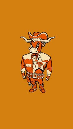 an orange and white cow wearing a cowboy hat