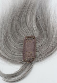 Synthetic hair topper with bangs for women. Two-clip silk realistic center part. It is the perfect solution for hair loss to add more volume to your hair. It also works best for female-pattern baldness and thinning hair near the crown area or broader part. Human Hair Toppers For Thinning Hair, Hair Toppers For Thinning Hair, Grey Hair Topper, Bun Extensions, Grey Hair Pieces, Female Pattern Baldness, Buy Wigs, Hair Silver, Beautiful Gray Hair