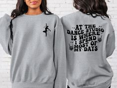 At The Dance Studio Is Where I Spend Most Of My Days Sweatshirt, Dance Mom Sweatshirt, Dance Studio Sweatshirt, Dance Lover Sweatshirt Hi! Welcome to✨Northstar ✨ ✨As the weather gets colder, you want clothes that keep you and your body warm. Here, Northstar  is ready to keep you warm with its unique designs..✨ ✨Product Features✨ 👉Medium-heavy fabric (8.0 oz/yd² (271.25 g/m 👉Loose fit 👉Runs true to size 👉50% cotton, 50% polyester 👉Tear-away label ✨Care Instructions✨ 👉Wash item inside out in Long Sleeve T-shirt With Letter Print For Dance, Crew Neck Sweatshirt With Letter Print For Dance, Long Sleeve Letter Print T-shirt For Dance, Crew Neck Graphic Print Sweatshirt For Dance, Graphic Print Crew Neck Sweatshirt For Dance, Hip Hop Crew Neck Top For Dance, Hip Hop Style Crew Neck Top For Dance, Long Sleeve Graphic T-shirt For Dance, Long Sleeve Graphic Print T-shirt For Dance