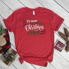 Christmas Tshirt says "It's Never too early for Christmas Music" We do not use heat transfer vinyl, iron on transfers or screen printing. We use a cutting edge professional DTG printing process that puts eco-friendly ink directly into the fabric.Available in S, M, L, XL, 2XL. UNISEX SIZING - when ordering for women If you want a tighter fit, order a size smaller. * S (SUGGESTED SIZE 2-4) 17” Width. 24.5” Length.* M (SUGGESTED SIZE 6-8) 19” Width. 25” Length.* L (SUGGESTED SIZE 10-12) 21” Width. Funny Christmas Shirts For Women, Moose Family, Christmas Shirts For Women, Bear Shirt, Christmas Music, Shirts For Women, Christmas Tshirts