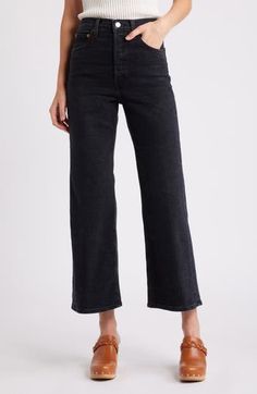 Wide legs and a cropped cut give these stretch-kissed jeans in a faded, stormy wash a retro vibe that's incredibly modern. Zip fly with button closure Five-pocket style 95% cotton, 4% elasterell-p, 1% Lycra® spandex Machine wash, tumble dry Imported High Rise Washed Black Flare Jeans For Work, Mid-rise Flare Jeans In Washed Black For Work, Black Cropped Denim Bottoms, Cropped Dark Wash Jeans For Fall, Fall Cropped Dark Wash Jeans, Washed Black Straight Leg Cropped Jeans For Fall, Cropped Black Denim Jeans, Fall Cropped Jeans With Button Closure, Chic High Rise Washed Black Jeans