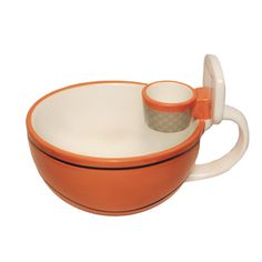 an orange and white bowl with two cups in it